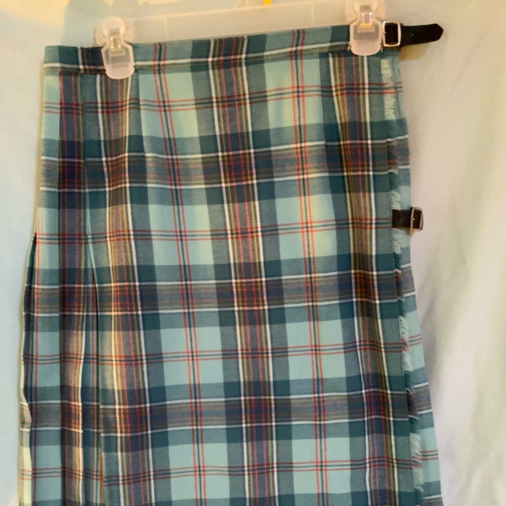 Genuine Scottish ladies kilt shades of teal, blue, red and cream. 100% wool